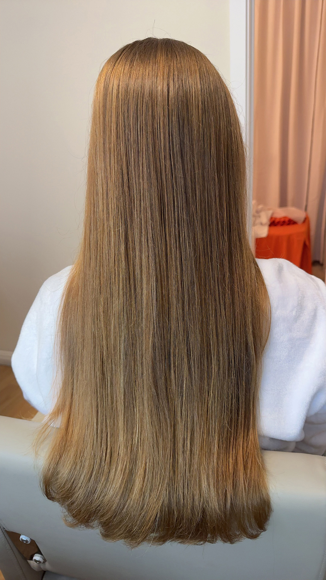Long silky hair after intensive scalp therapy and deep conditioning treatment