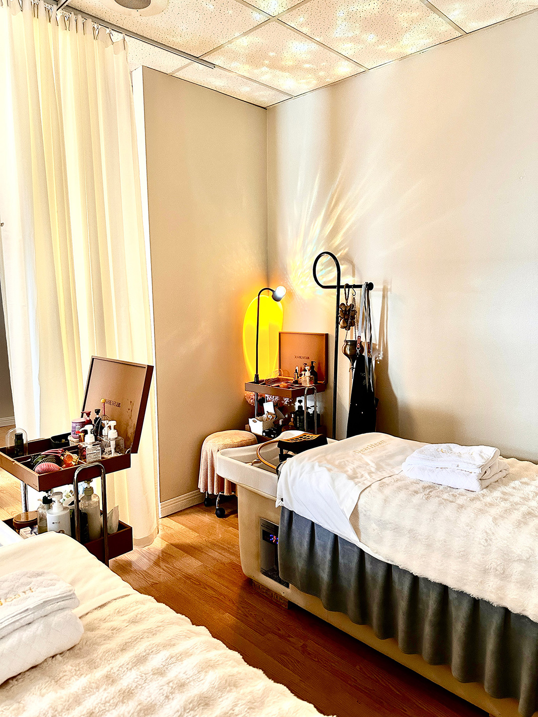 Cozy and relaxing head spa treatment room with warm ambient lighting